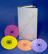 Фотография коллекционного издания «Elvis Aron Presley»: буклет о жизни и музыке, 4 CD-диска